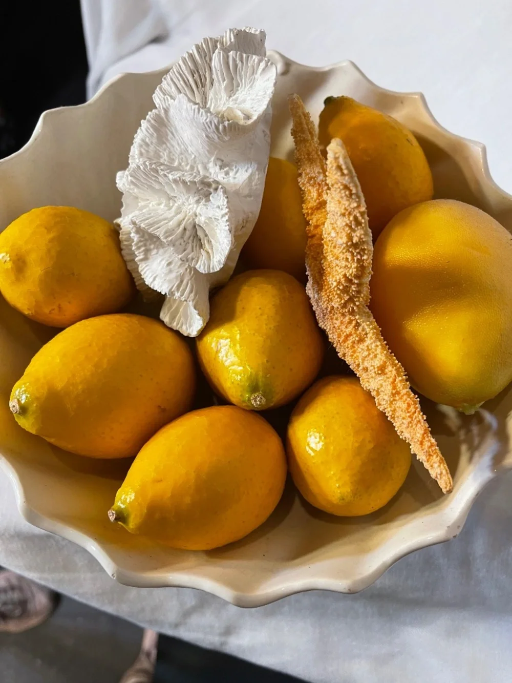 White Ceramic Pedestal Bowl with Yellow Lemons and Coral Accents